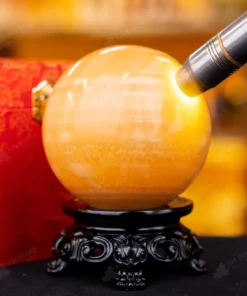 Quả Cầu Đá Phong Thủy Hoàng Long (Onyx) Vàng - 1,4kg - M1836140